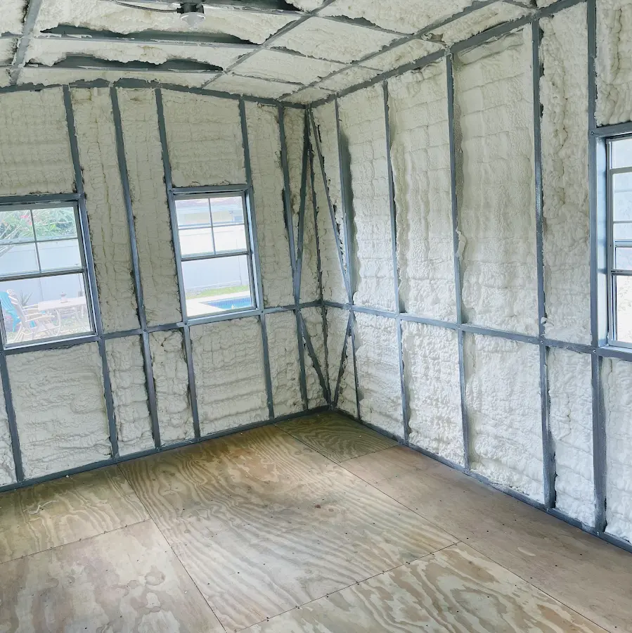 Closed-cell spray foam insulation applied to wall cavities in a residential project in Mendota Heights